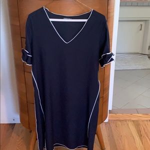 Navy dress with white piping trim